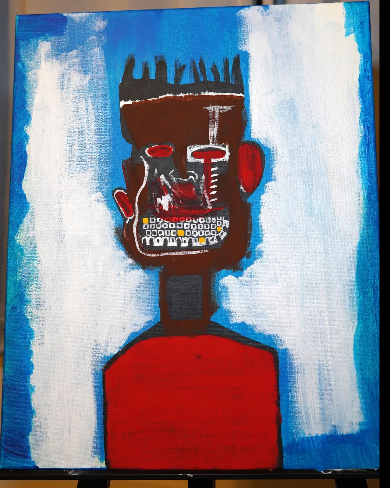 Golds, a painted portrait of a figure with a red shirt and gold teeth against a pale blue background